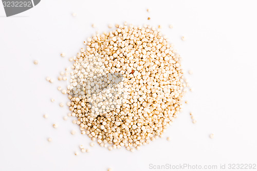 Image of Pile of quinoa grain on a white background 