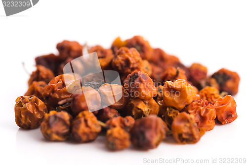 Image of Dried rowan berries on a white background 