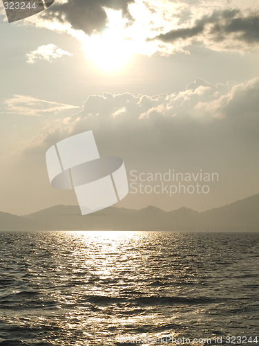 Image of Sun, sea and clouds