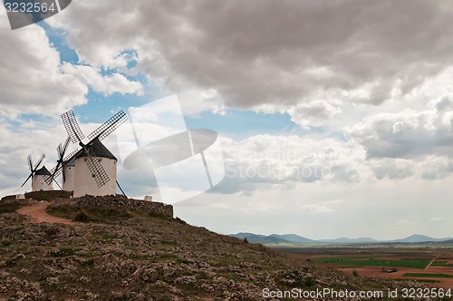 Image of Traditional white windmills in Consuegra, Spain