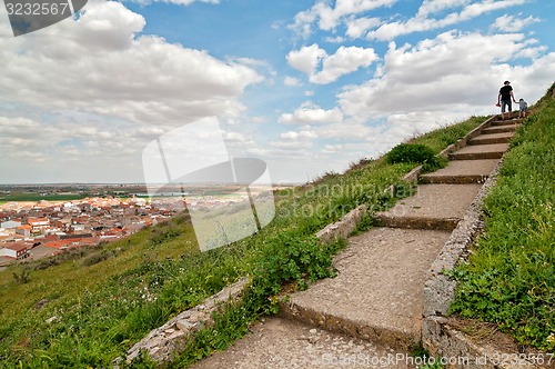 Image of Man and boy at the top of the staircase.