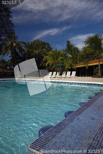 Image of infinity pool with float caribbean sea