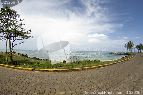 Image of caribbean tile stone road empty beach