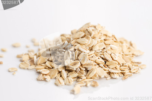 Image of Oat flakes pile on white background