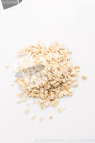 Image of Oat flakes pile on white background