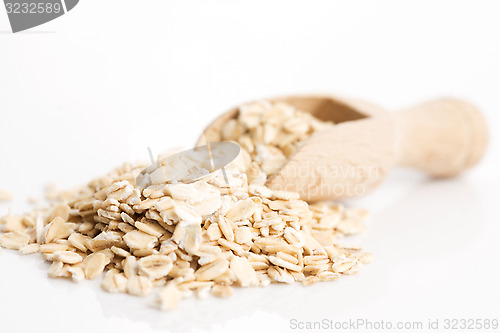 Image of Oat flakes pile on white background