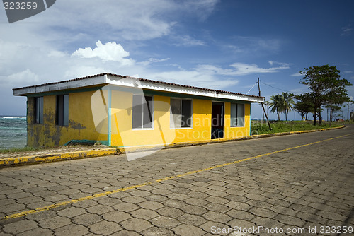 Image of yellow building caribbean seaside
