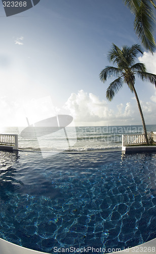 Image of infinity pool with float caribbean sea