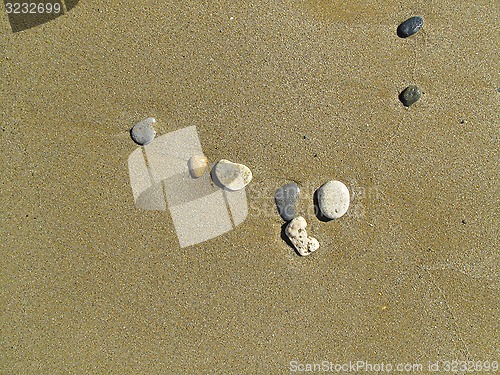 Image of Sand background with sea pebbles     