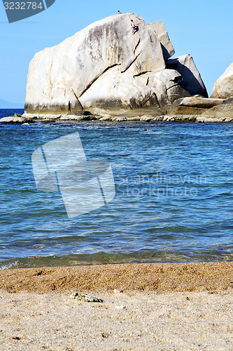 Image of   tao coastline  isle   big  rocks  froth foam  