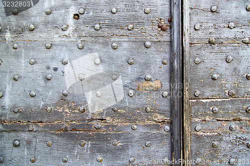 Image of  cross lombardy   arsago seprio   knocker in a  door   wood ital