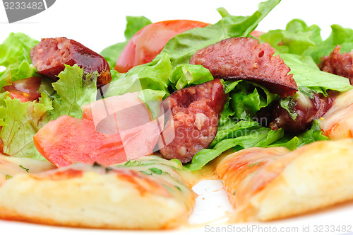 Image of Pizza slices and salad