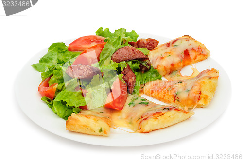 Image of Pizza slices and salad