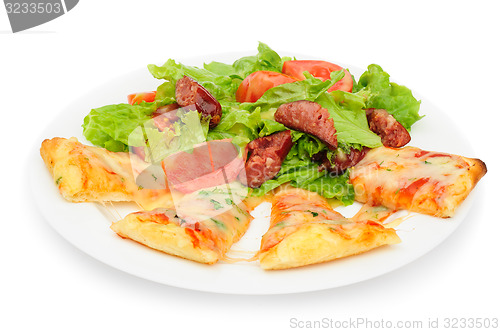 Image of Pizza slices and salad