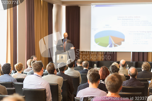 Image of Speaker at Business Conference and Presentation
