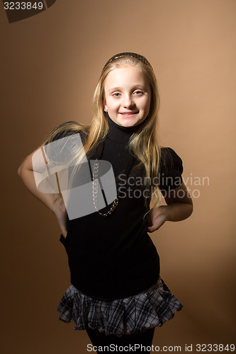 Image of Fashion smiley european little girl posing