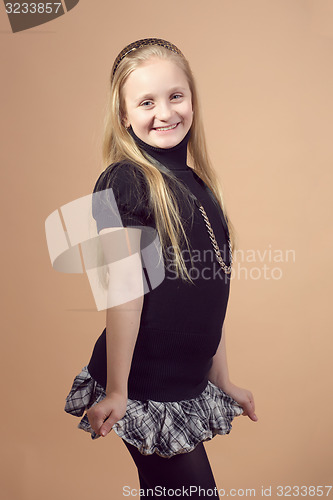 Image of Fashion smiley european little girl posing