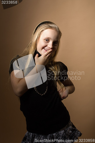Image of Fashion smiley european little girl posing