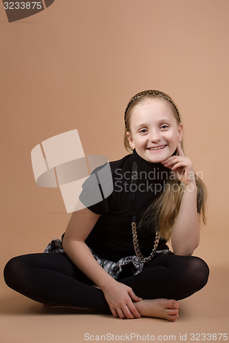 Image of Fashion smiley european little girl posing