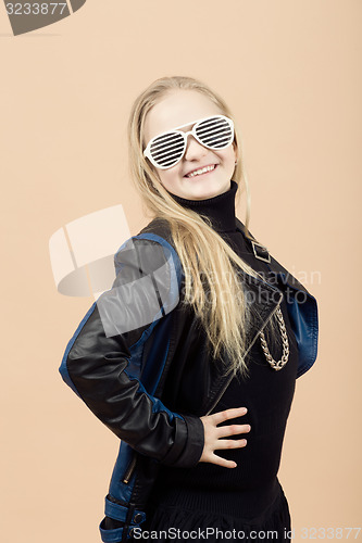 Image of Fashion smiley european little girl posing