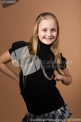 Image of Fashion smiley european little girl posing