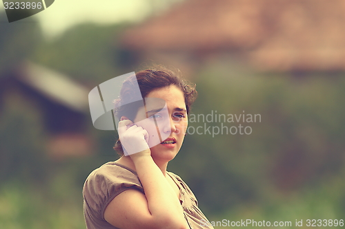 Image of young woman outdoor portrait