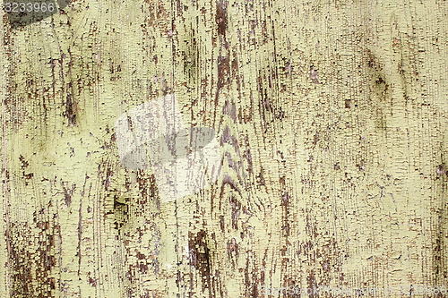 Image of weathered green paint on wood plank