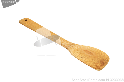 Image of wooden spatula over white