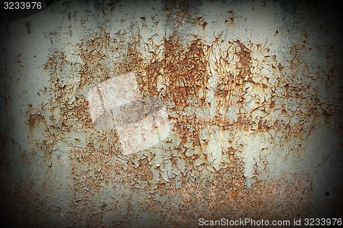 Image of rusted painted metallic board