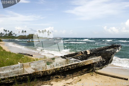 Image of damaged boat on beach nicaragua