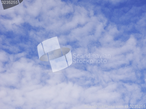 Image of Retro look Blue sky with clouds background