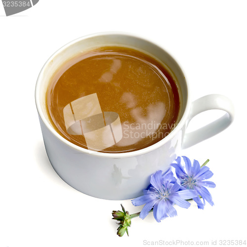 Image of Chicory drink in white cup with blue flower