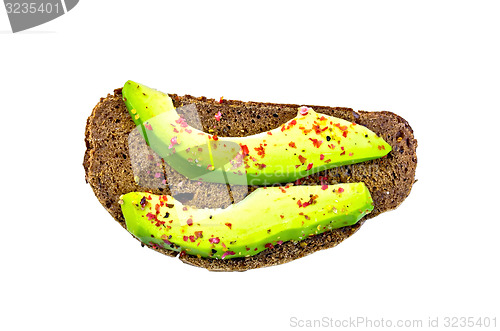 Image of Sandwich with avocado and spices on top
