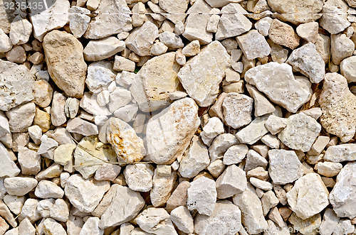 Image of Crushed sandstone on road