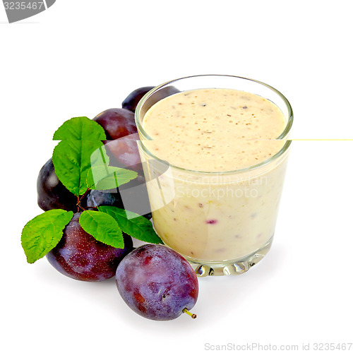 Image of Milkshake with plums and leaves