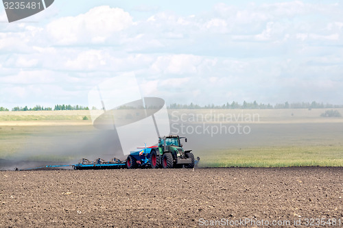 Image of Tractor working on arable land