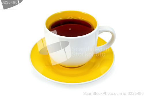 Image of Tea in white-yellow cup