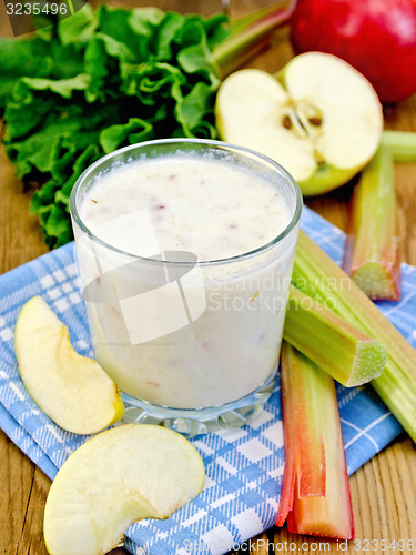 Image of Milkshake with rhubarb and apples on napkin