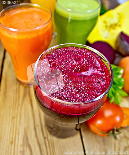 Image of Juice beetroot and vegetable on board top