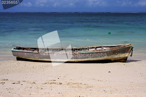 Image of boat and  beach in belle mare