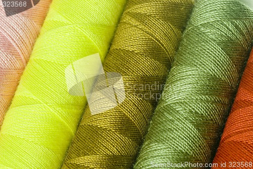Image of Colorful sewing threads texture


