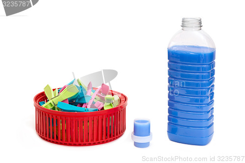 Image of Laundry detergent and clothespins