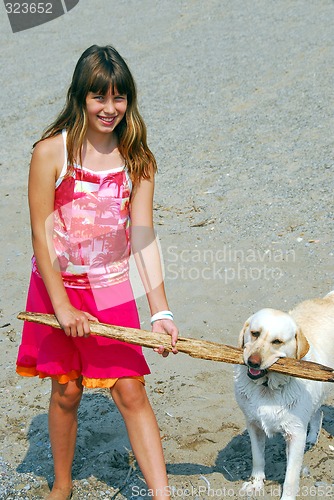 Image of Girl play dog