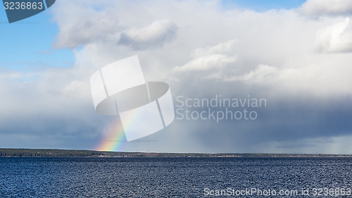 Image of Rainbow in cloudy sky