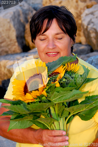 Image of Mature woman flowers