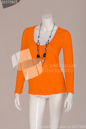 Image of  orange T-shirt with chain