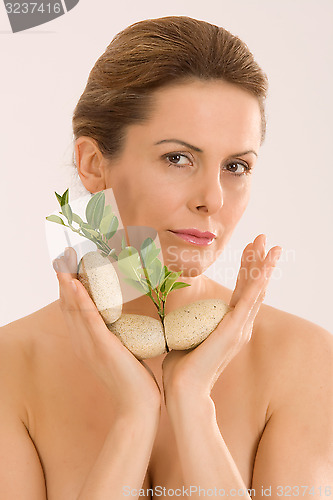 Image of Woman while relaxing with aromatherapy