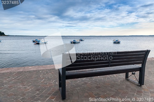 Image of Wood bench at the Garda lake