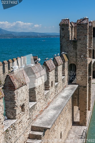 Image of Castello Scaligero, built in XIV century, Lake Garda, Sirmione, Italy