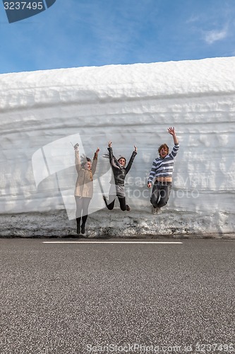 Image of highway along the snow wall. Norway in spring